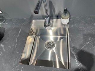 Kitchen sink with ceramic worktop
